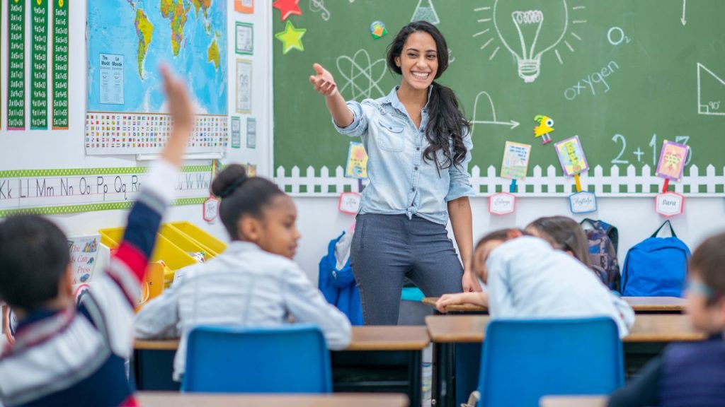 teacher in classroom setting