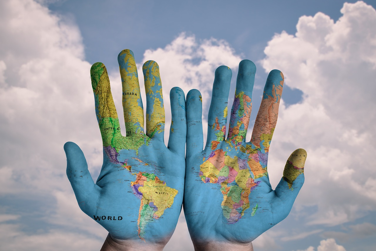 world map on hands