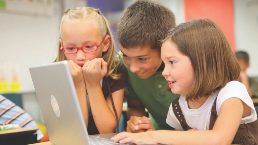 kids playing a coding game